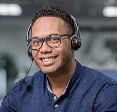 A male call center agent that is making outbound calls at the 'bpo outsourcing services in australia', also known as packleaderbpo.