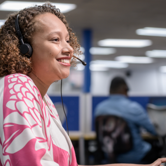 A female call center agent that is making outbound calls at the ' top bpo outsourcing services in australia', also known as packleaderbpo.